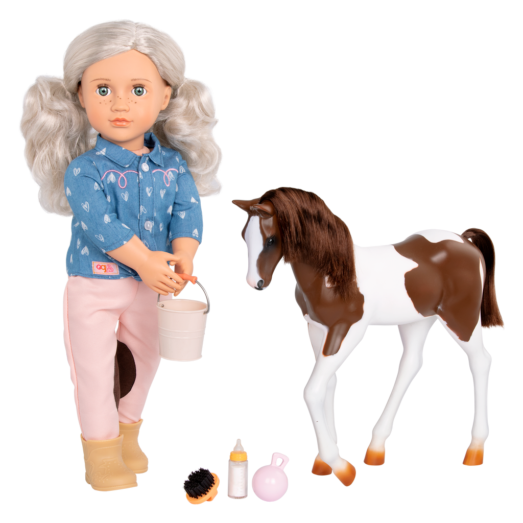 18-inch doll with silver hair, green eyes, horse accessories and toy foal