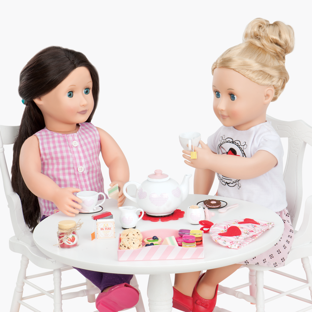 Two 46 cm dolls using tea playset