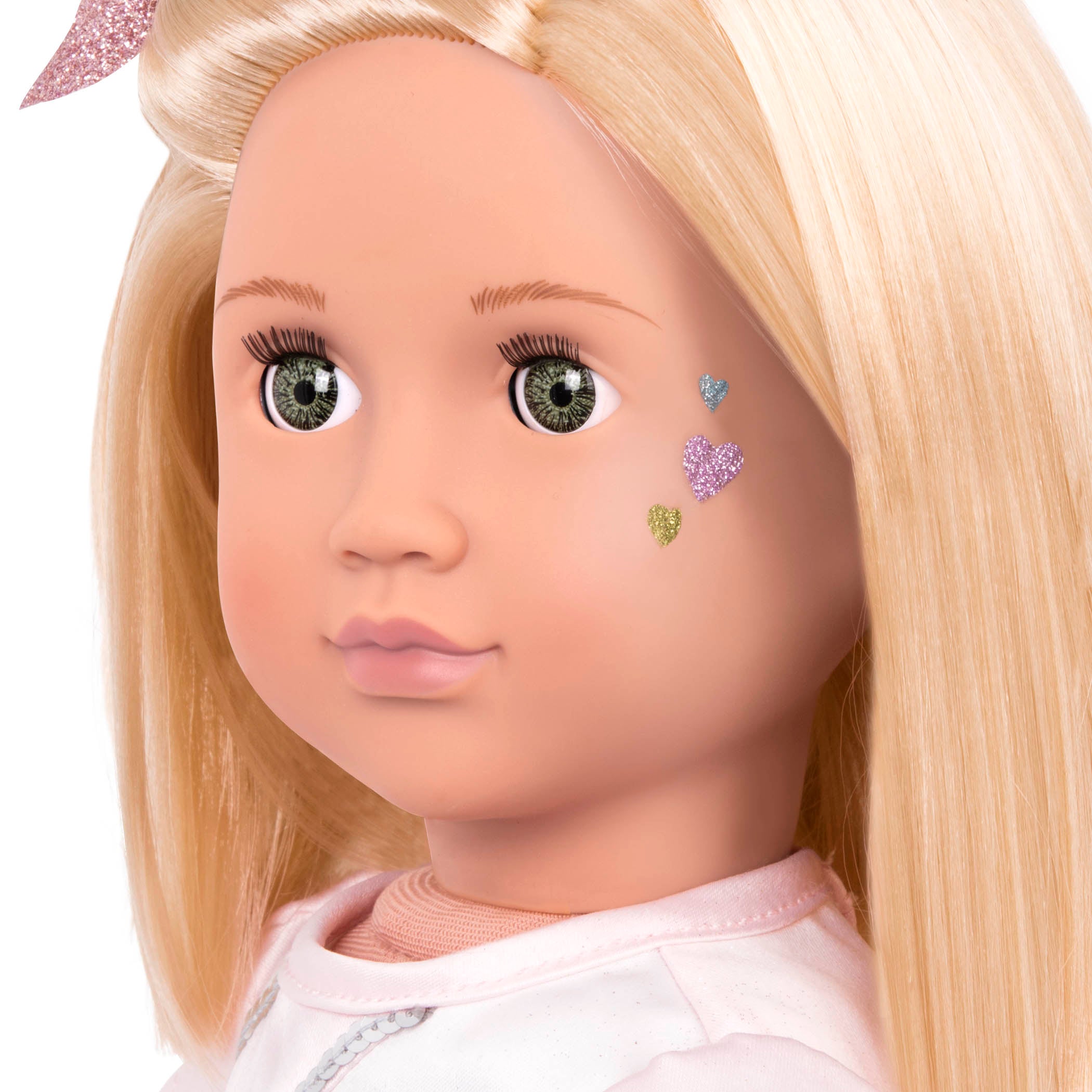18-inch doll with blonde hair, green eyes and glitter tattoo decals