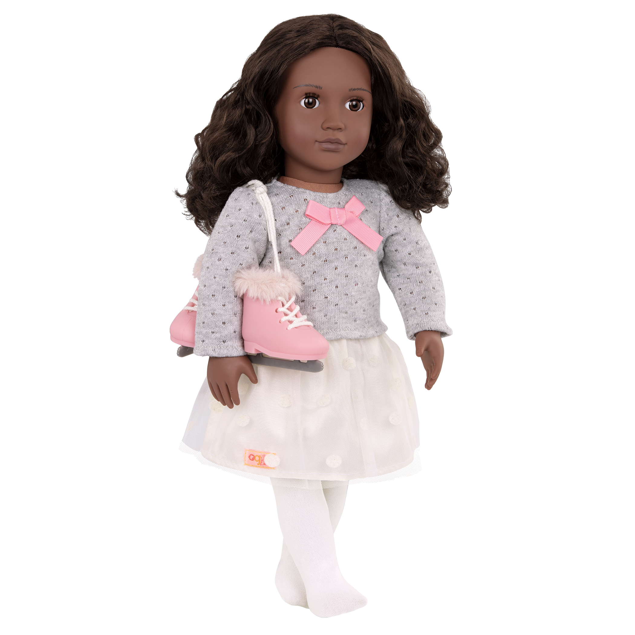 18-inch doll with brown hair, brown eyes and ice skates